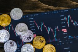 cryptocurrency coins over chart background